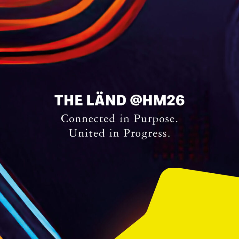Teaserbild für die Hannover Messe 2026 mir roten, blauen und gelben Designelementen. Zu sehen ist die Überschrift THE LÄND @HM26 sowie die Unterüberschriften Connected in Purpose. United in Progress.